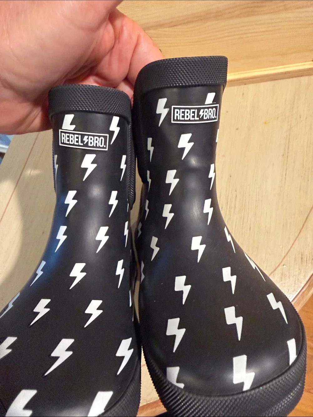rebels Black Rain Boots with White Lightning Bolts